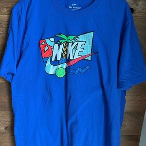 2, mens X-Large Nike t shirts. One grayish blue, the other Royal Blue.